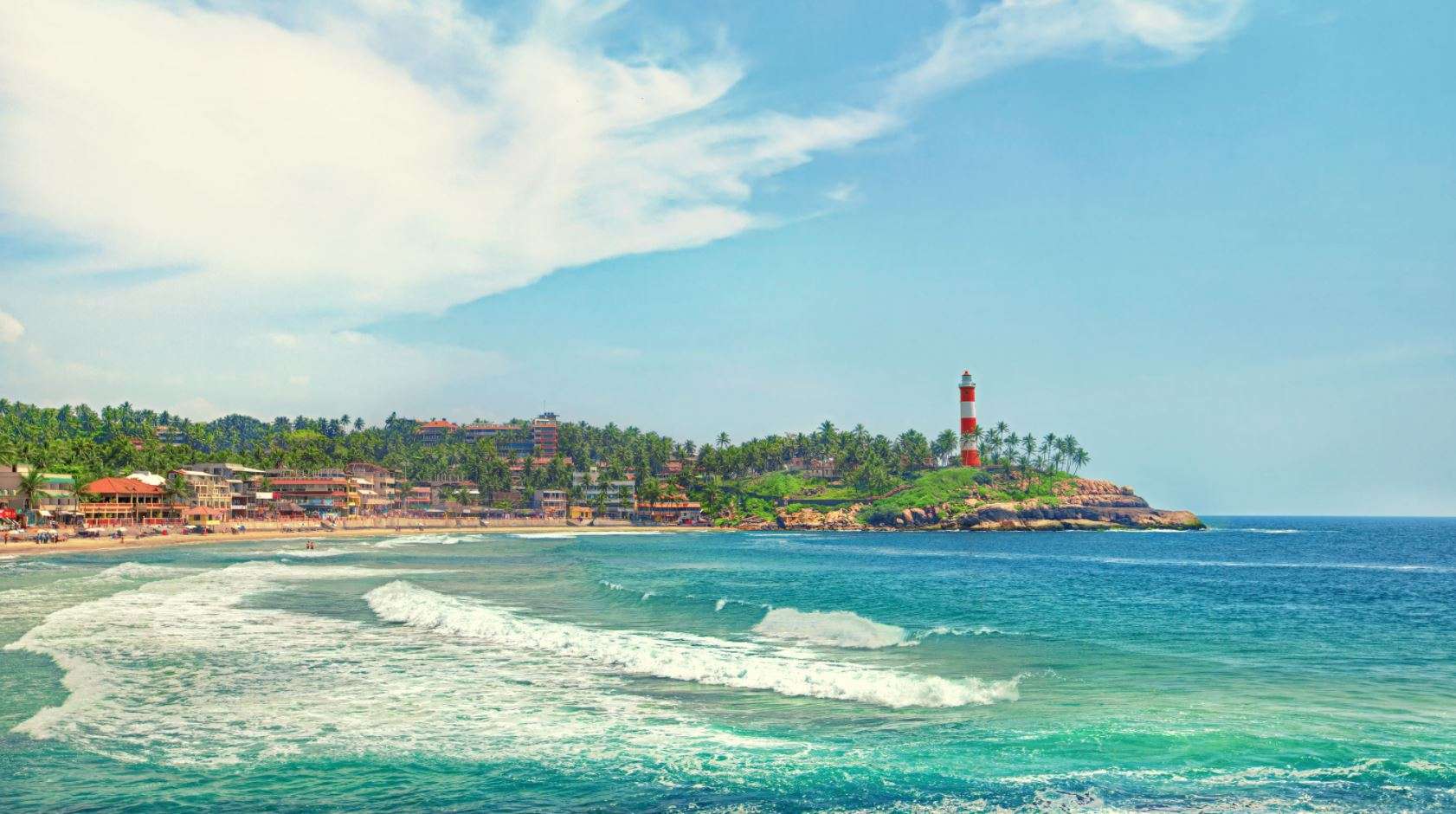 Take Sun Bath At Kovalam Beach
