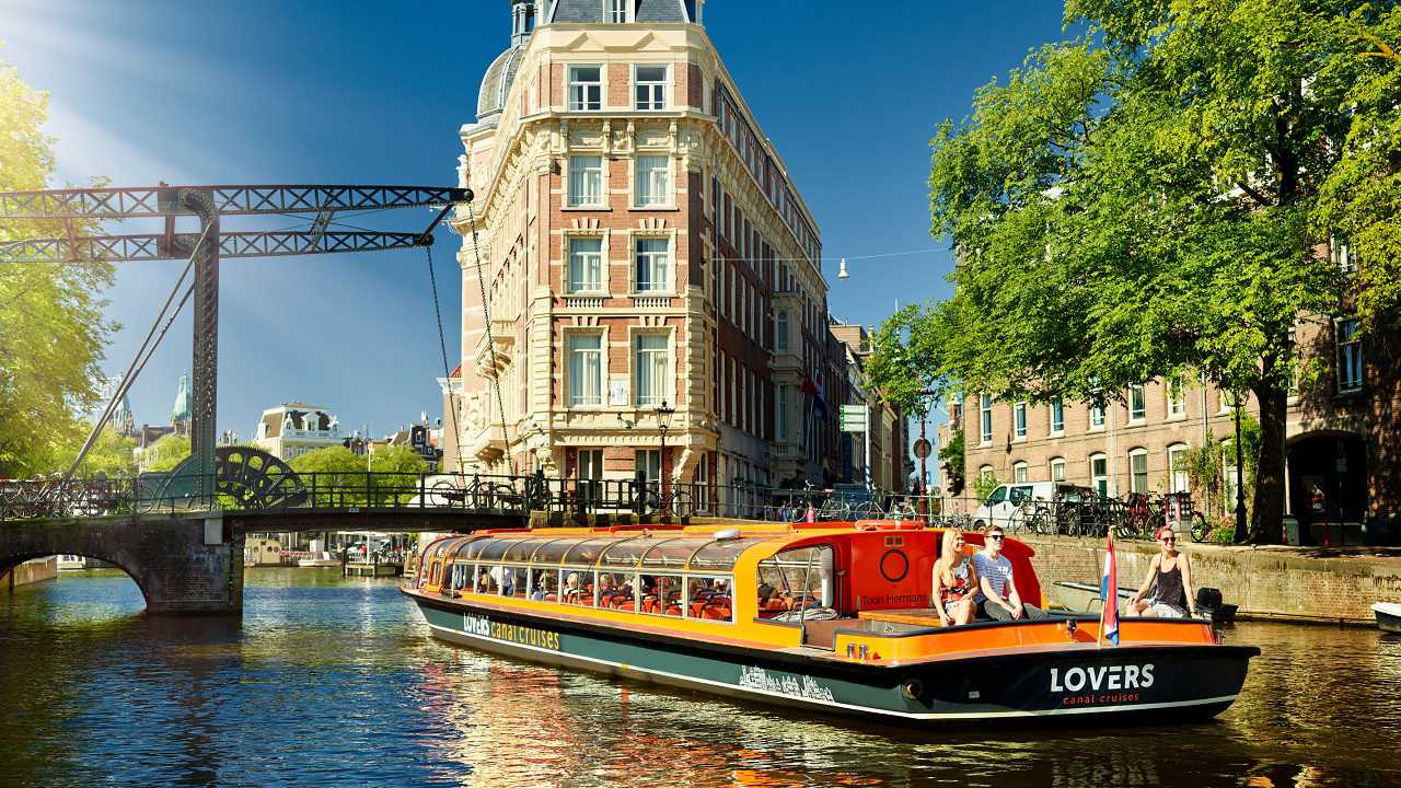 Take A Canal Tour In Amsterdam