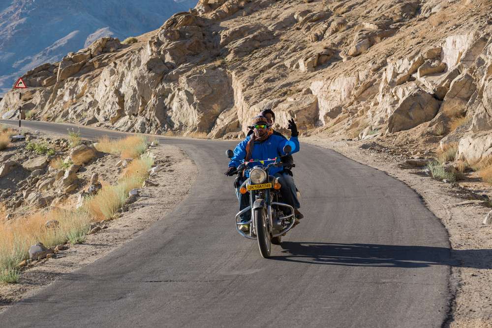 Can 3 people take a ride on one single bike around Ladakh?