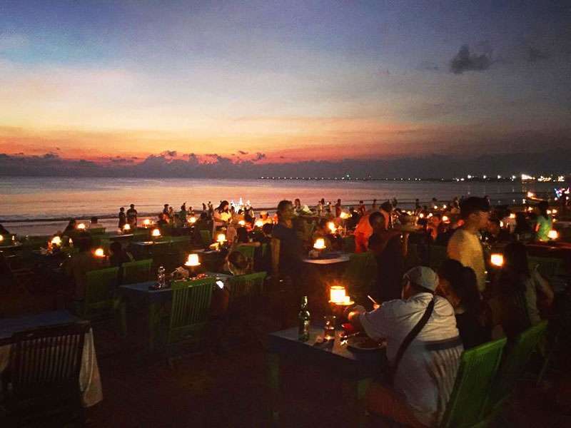 Have a Beachside Dinner By Sunset at Jimbaran Beach