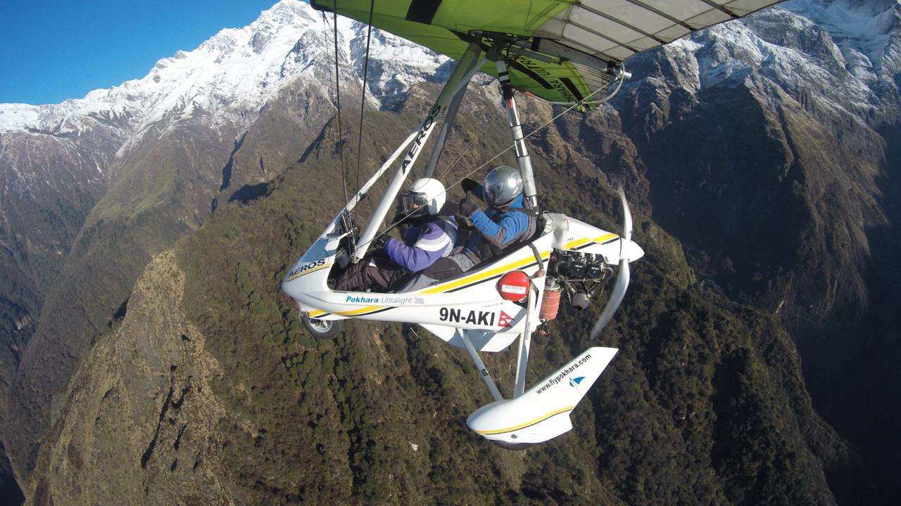 Microlight Flying over Himalayas, Book @ Flat 20% off