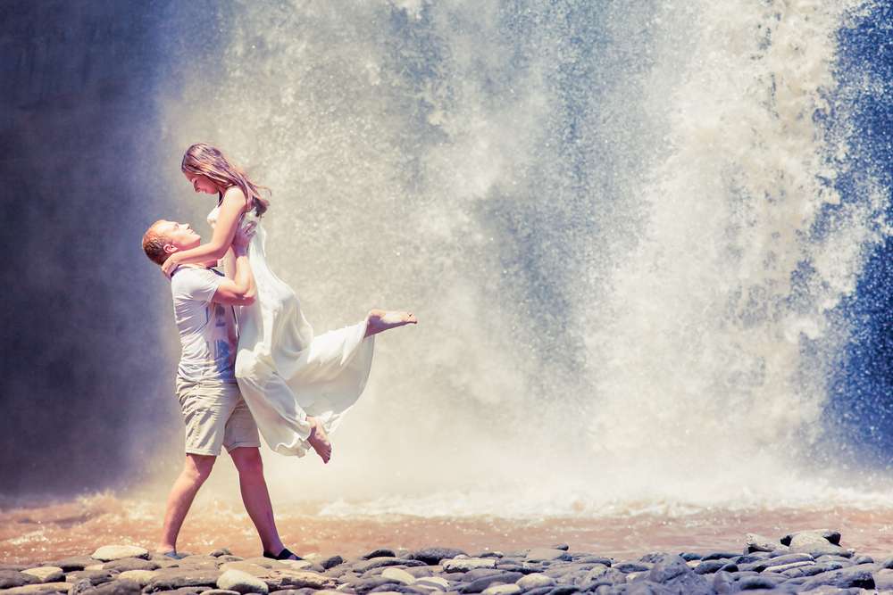 Visit Tukad Cepung Waterfall