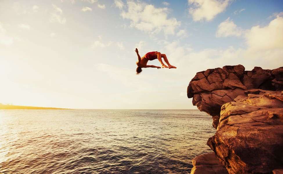 Visit Mahana Point cliff Jump