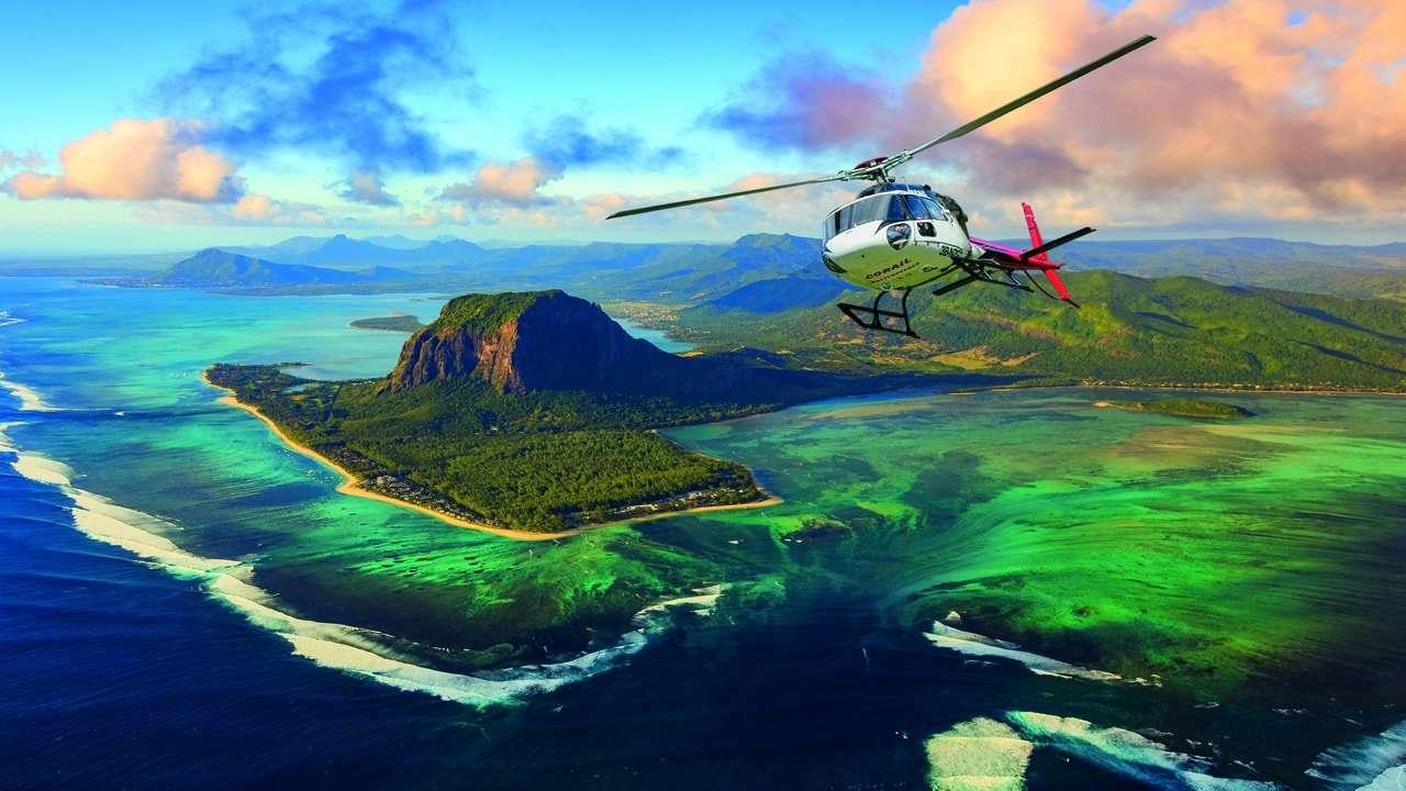 Take a Helicopter Ride to Underwater Waterfalls