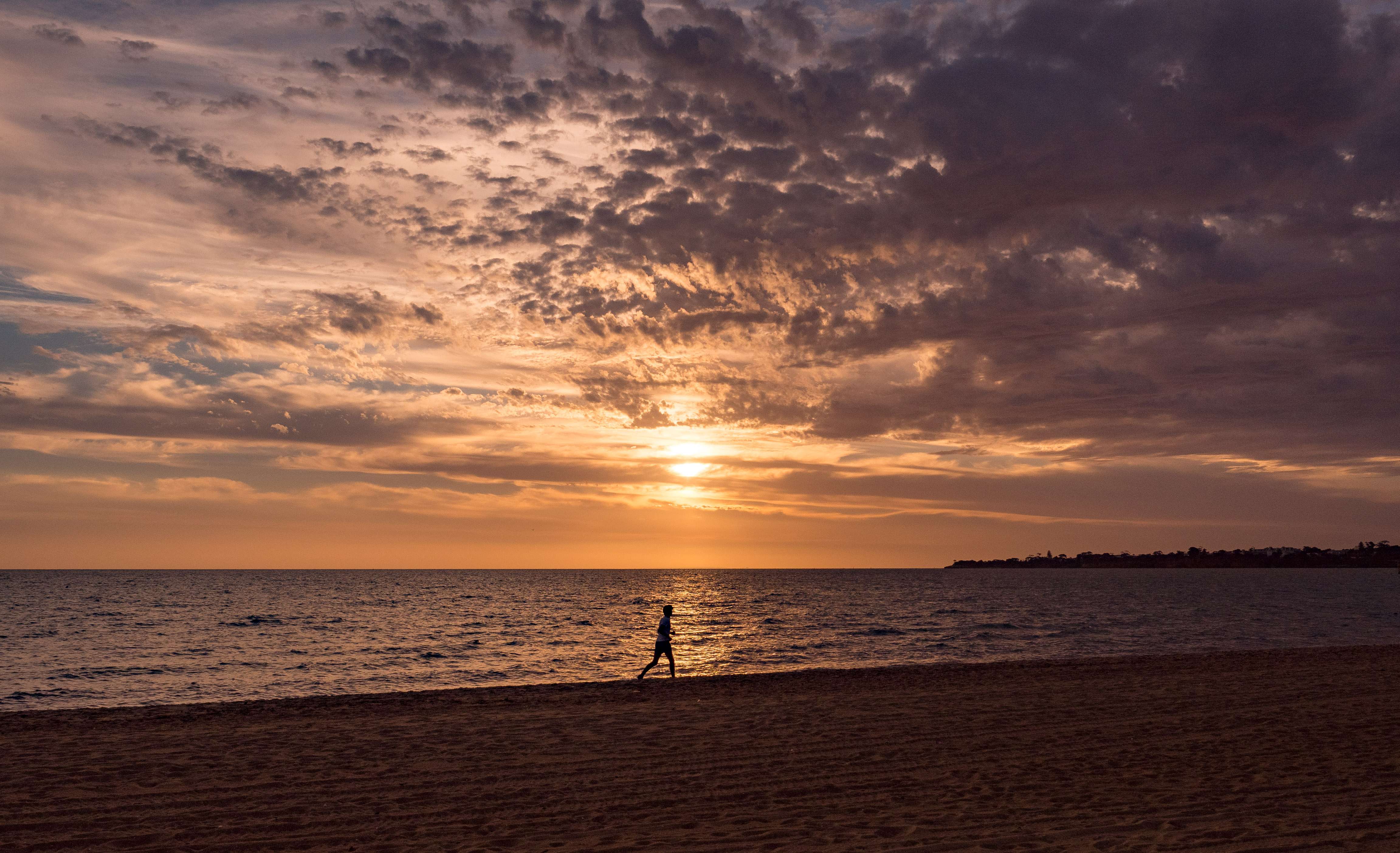 Sunbathe At Port Melbourne Beach
