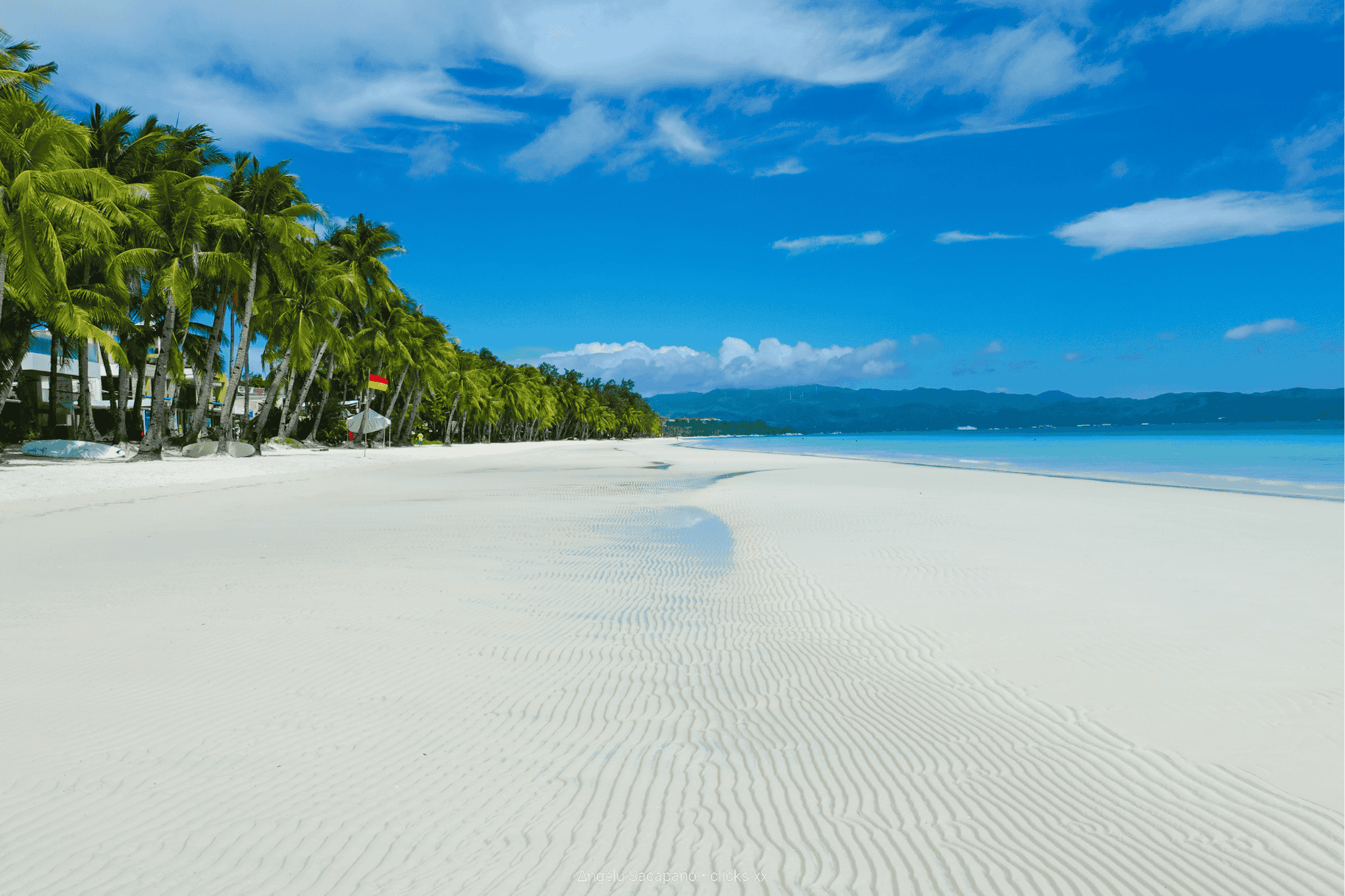 Visit Boracay’s white sand beaches 